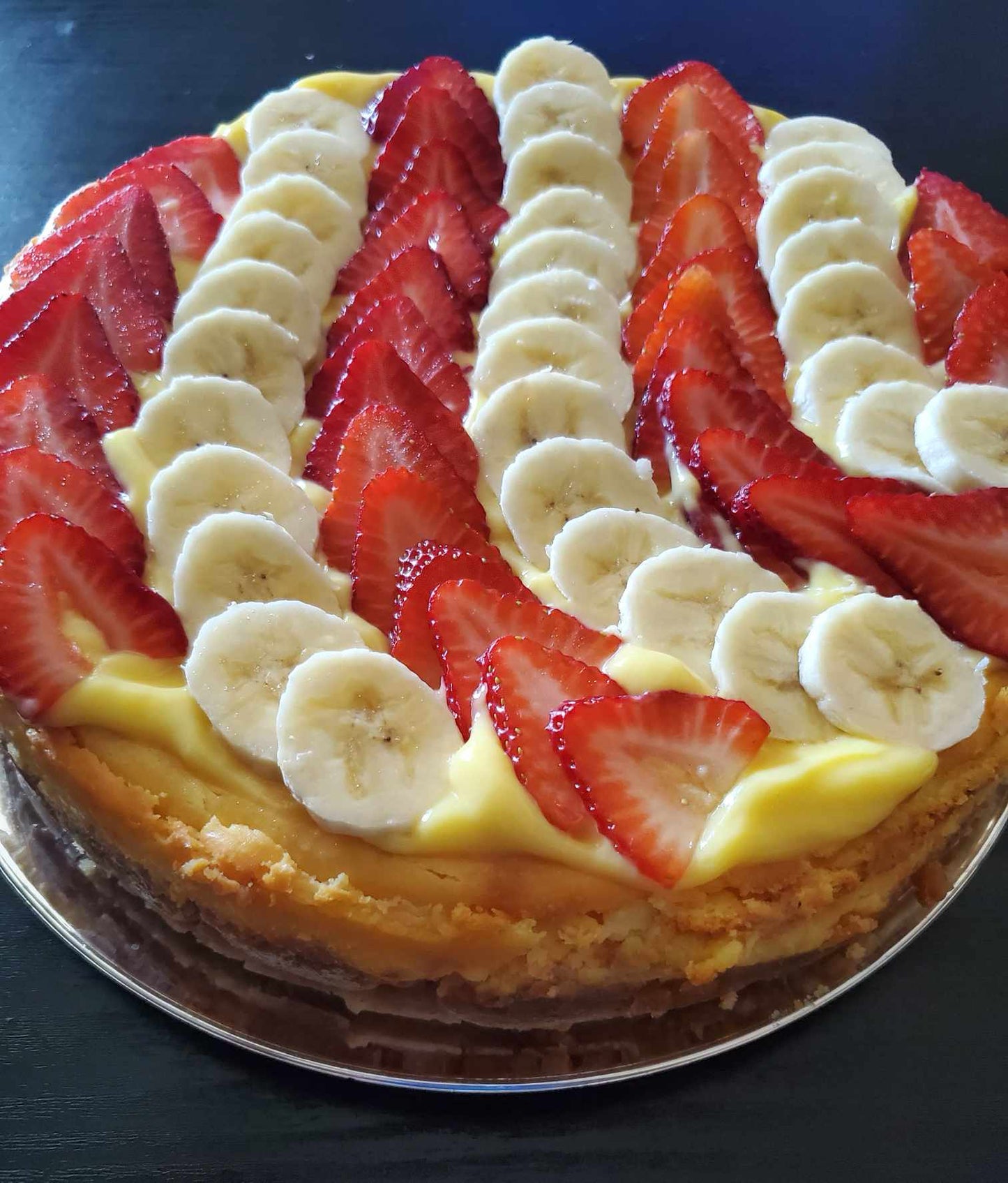 Strawberry and Banana Pudding Cheesecake